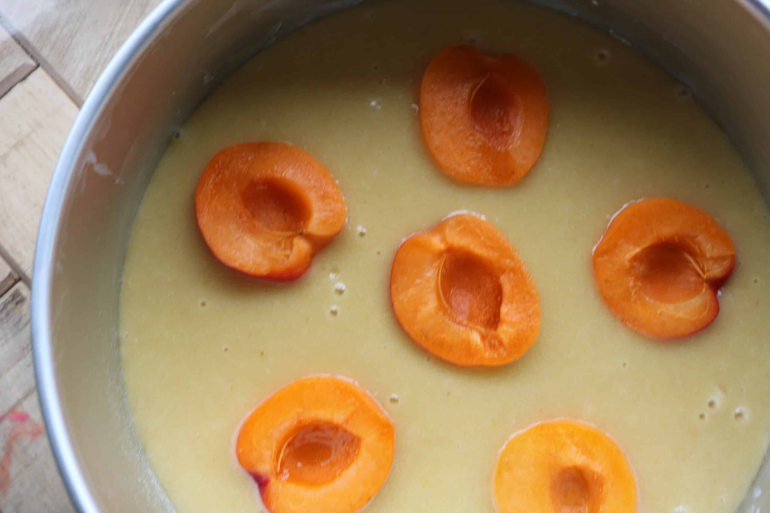 fresh apricots on top of batter