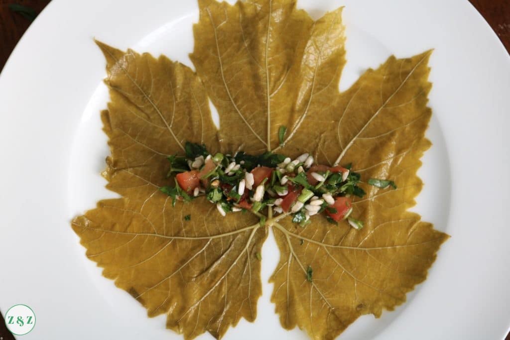 spread 1 tablespoon of mixture onto the vine leaf