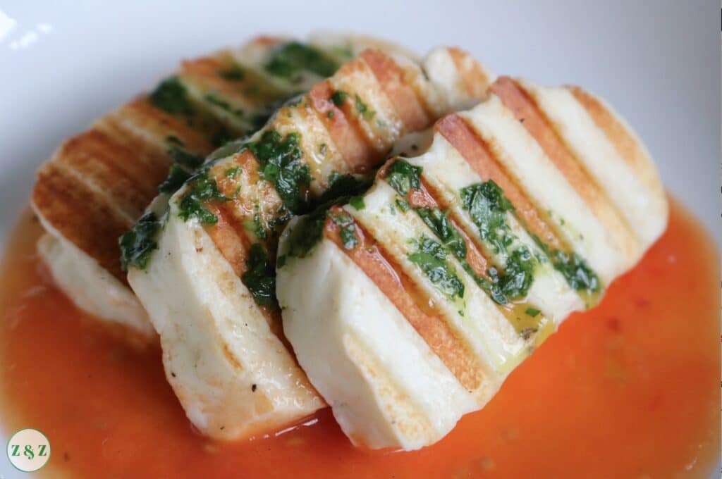 Grilled halloumi with tomato sauce