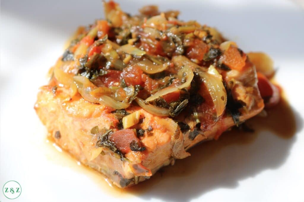 Salmon fillet with tomato and herb relish