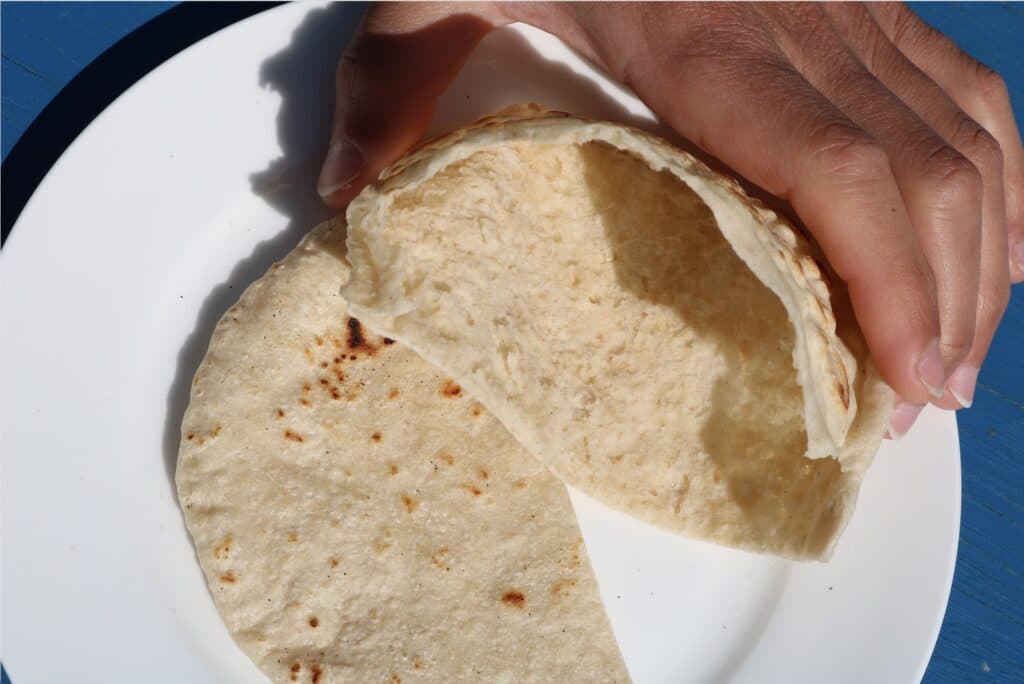 Baking Pita bread in a traditional bakery in Lebanon.