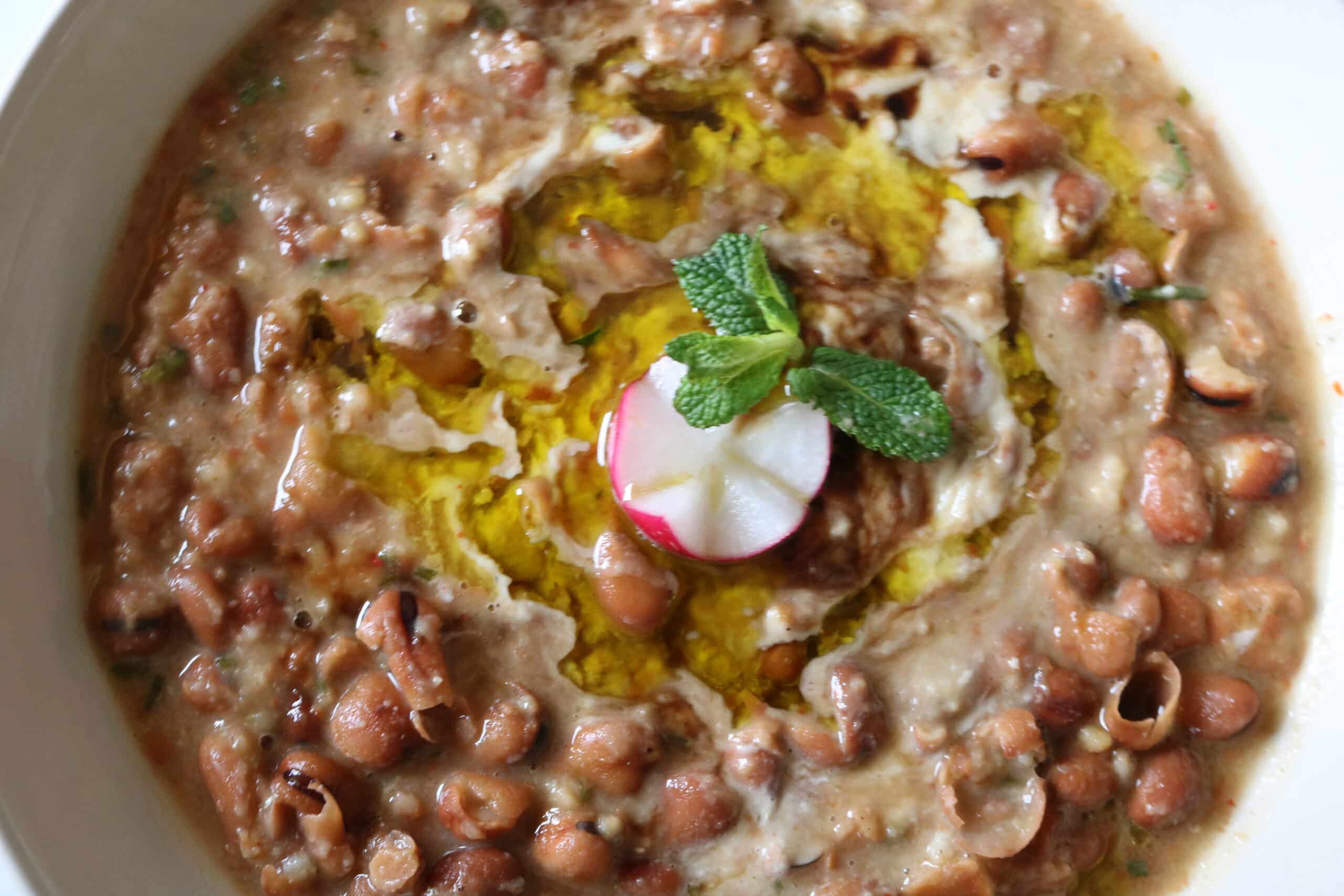 foul mudamas with tahini and pomegranate molasses